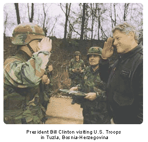 Clinton visits troops
